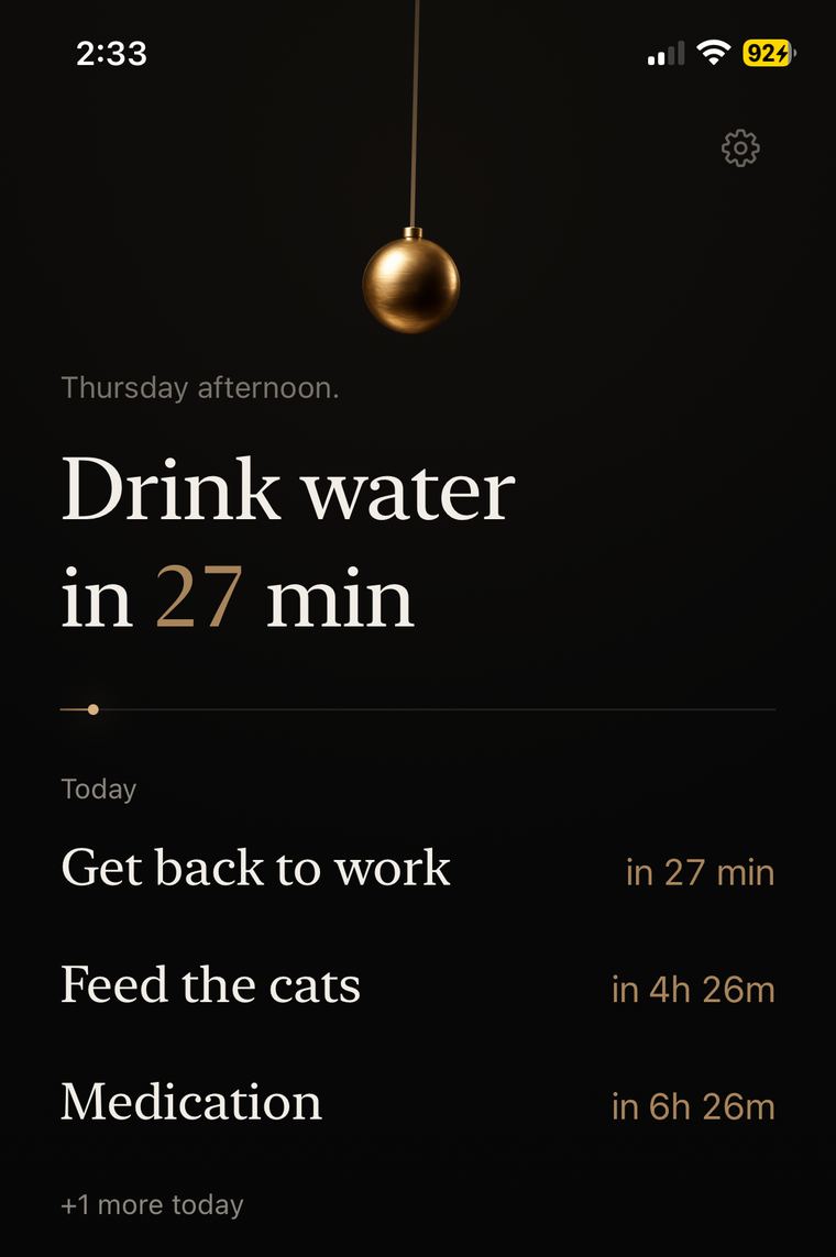 Wehem's home screen: the brass pendulum above “Drink water in 27 min”, with today's remaining reminders listed beneath it.